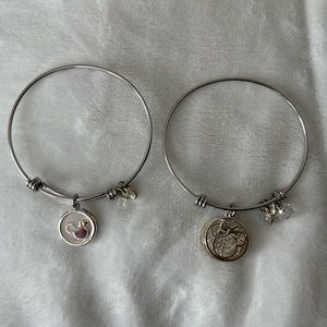 2 silver Disney charmed bracelets